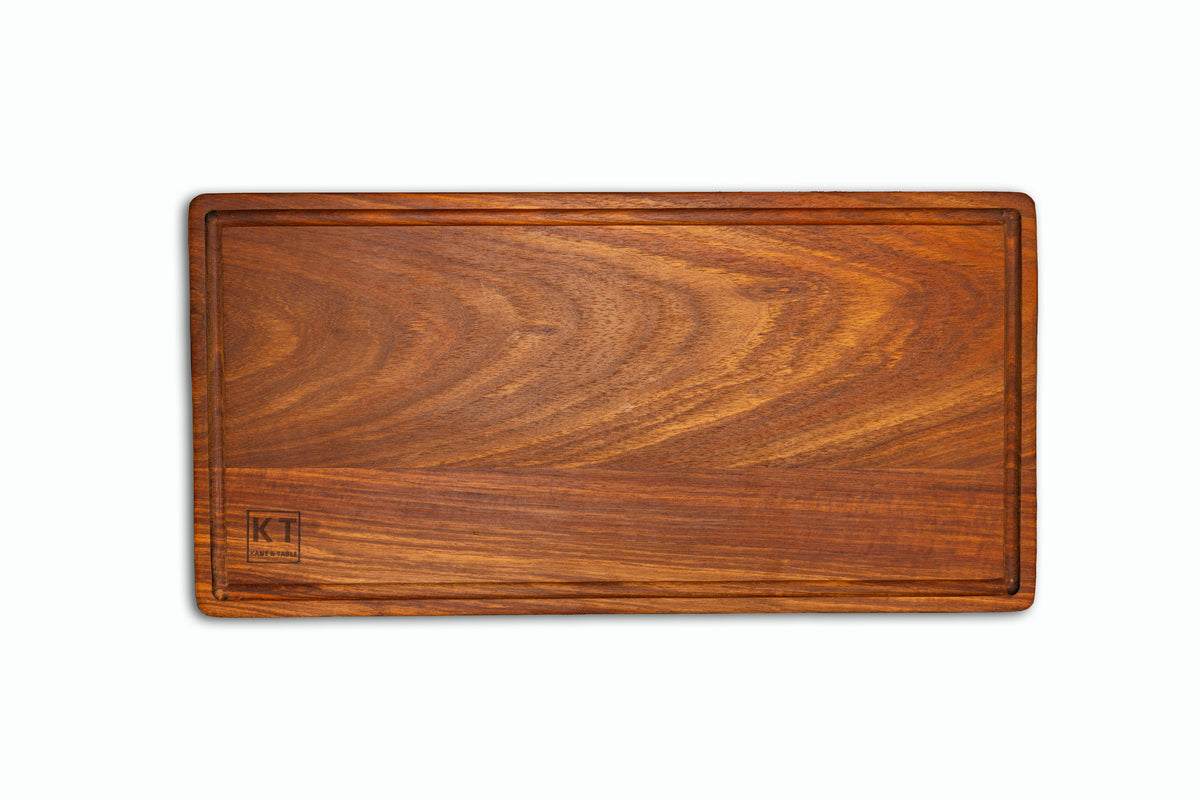 Large handcrafted wooden steak board with juice groove